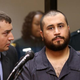 George Zimmerman, who was acquitted in the shooting death of Trayvon Martin, with his defense counsel (left) at a hearing on charges including aggravated assault stemming from a fight with his girlfriend Nov. 19, 2013, in Sanford, Fla.
Joe Burbank-Pool/Getty Images